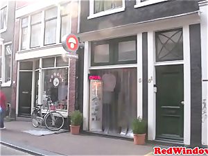 Amsterdam hooker deep-throats customer